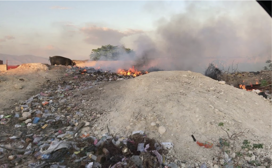 Trash burns in Cité Soleil.