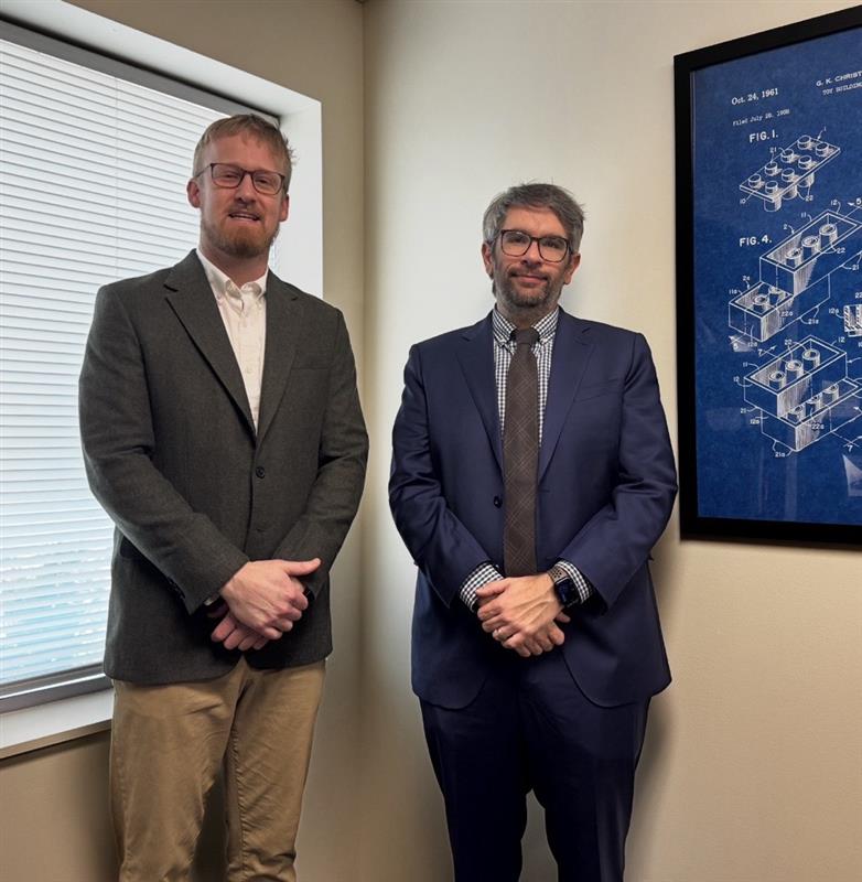 Ian J. Kolb and Assistant Professor Zach Catanzaro