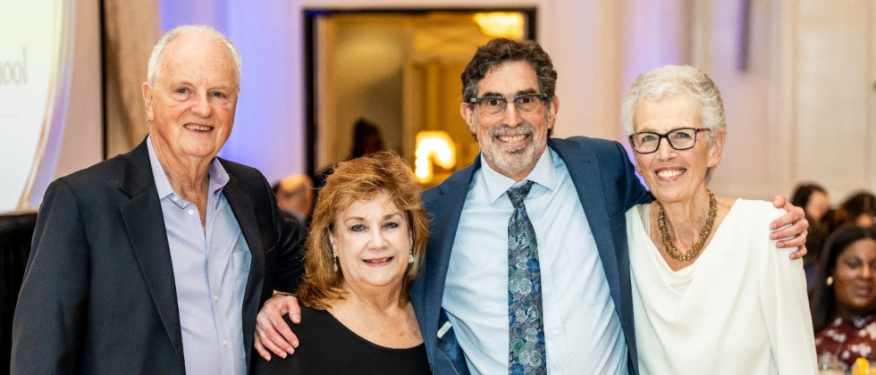 alt="From left, Emeritus Professor J. Patrick Kelly, Connie Sweeney, Distinguished Professor Alan Garfield, and Paula Garrison, retired executive assistant to the dean.  