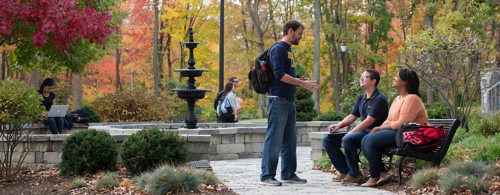 students at a campus having a discussion